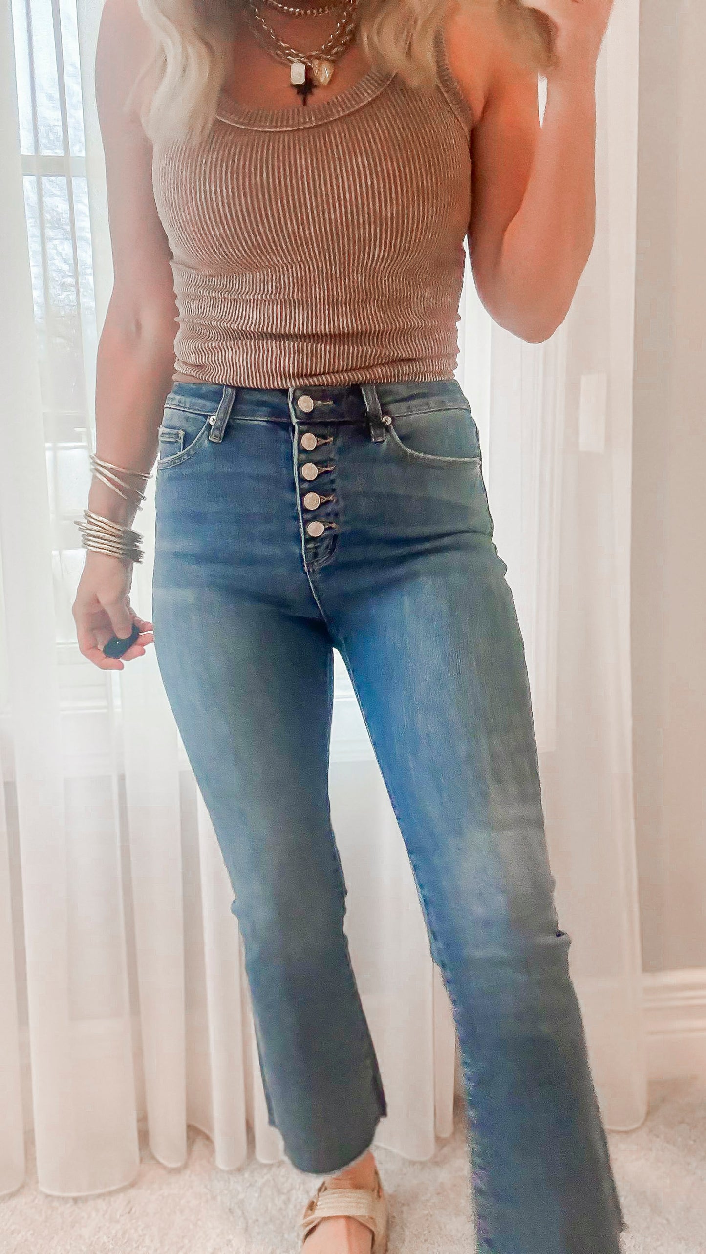 Button Fly medium wash denim paired with brown mocha tank