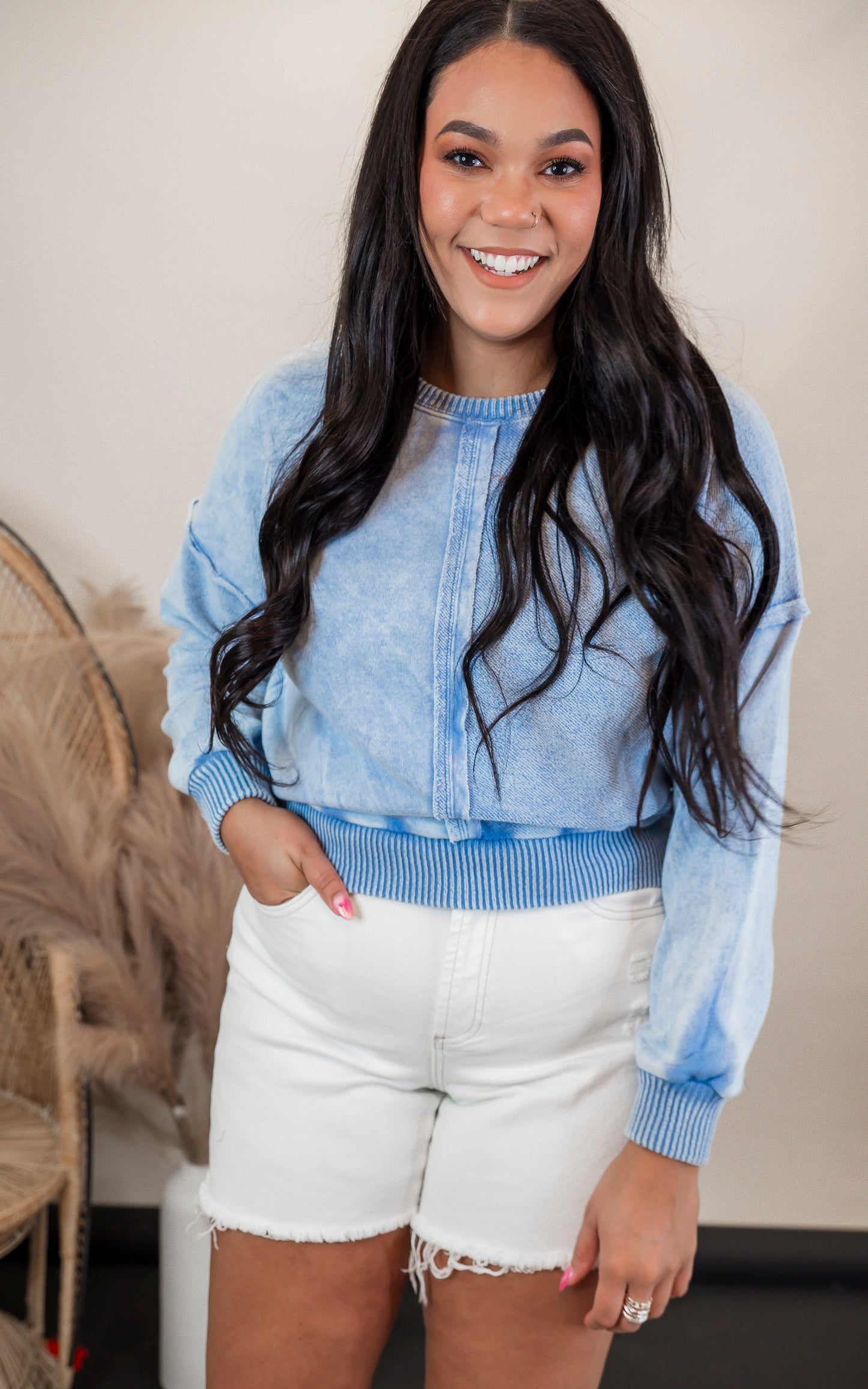 Super high rise MICA white shorts styled with distressing for a lived-in, trendy look.