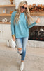 teal sweater