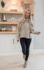 tan sweater