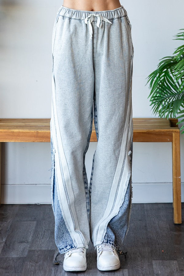Grey oversized denim jeans with two tone paneling and contrast side stripes.