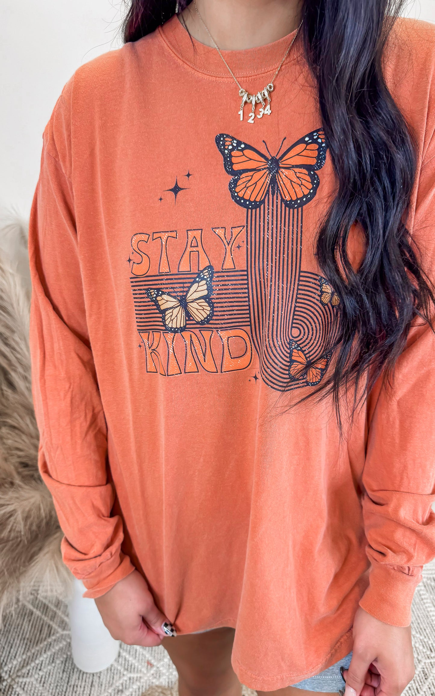 Stay Kind Garment Dyed Long Sleeve Graphic Top*