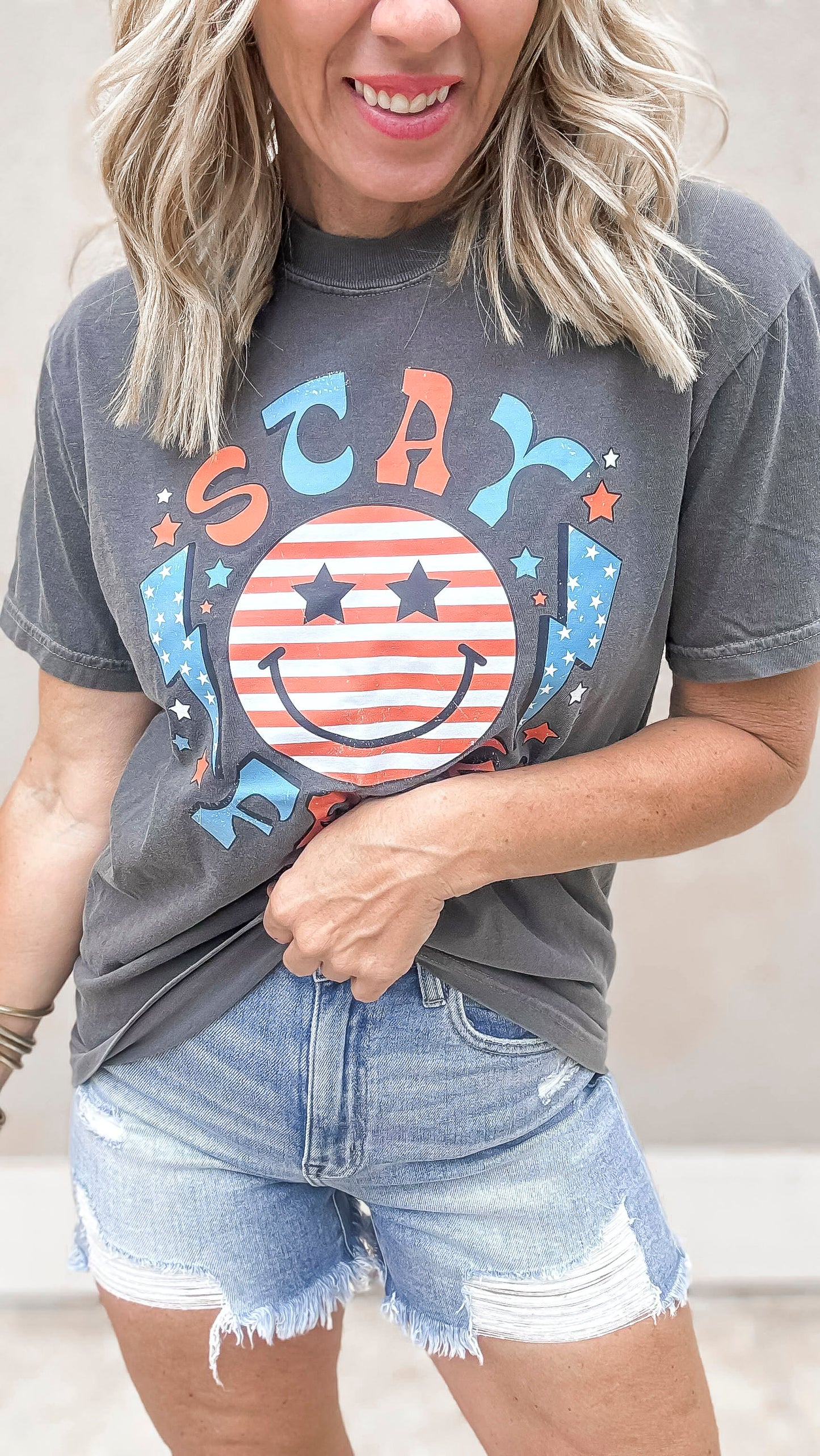 Stay Free smiley face graphic tee with Americana stars and stripes design.