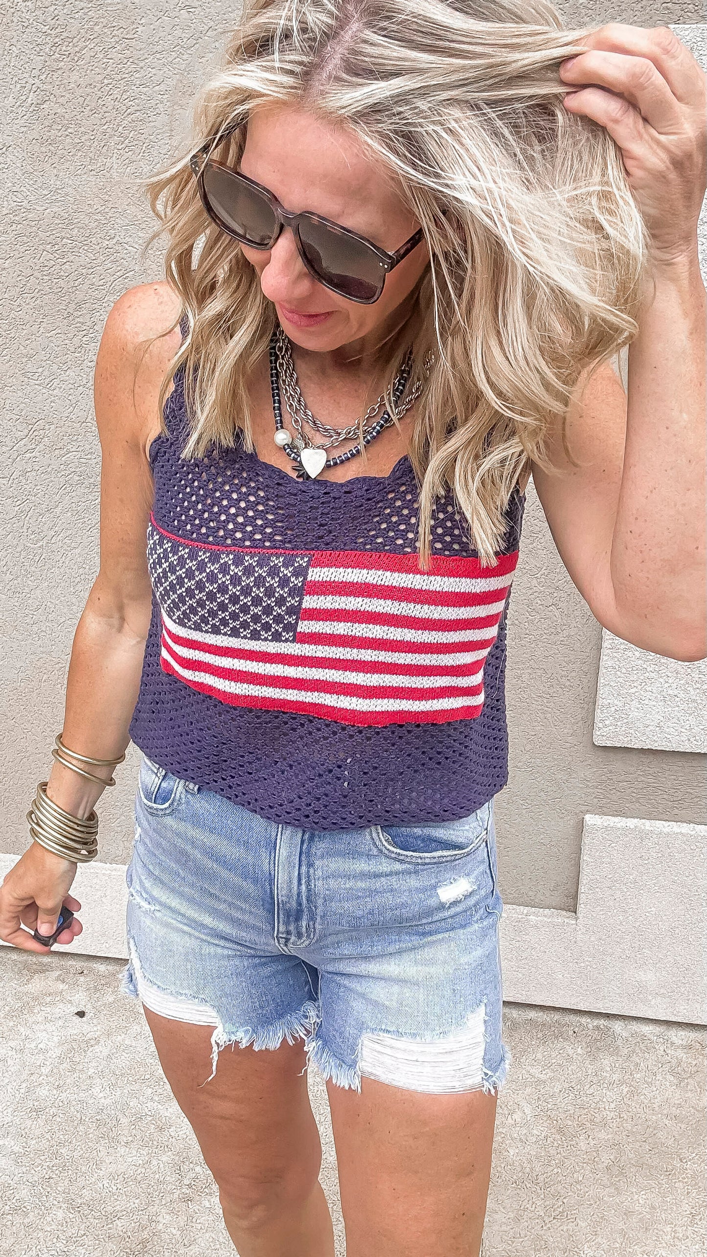 Crochet knit patriotic tank and distressed denim summer look.