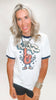 Retro-style game day graphic tee with navy accents and playful sports design.