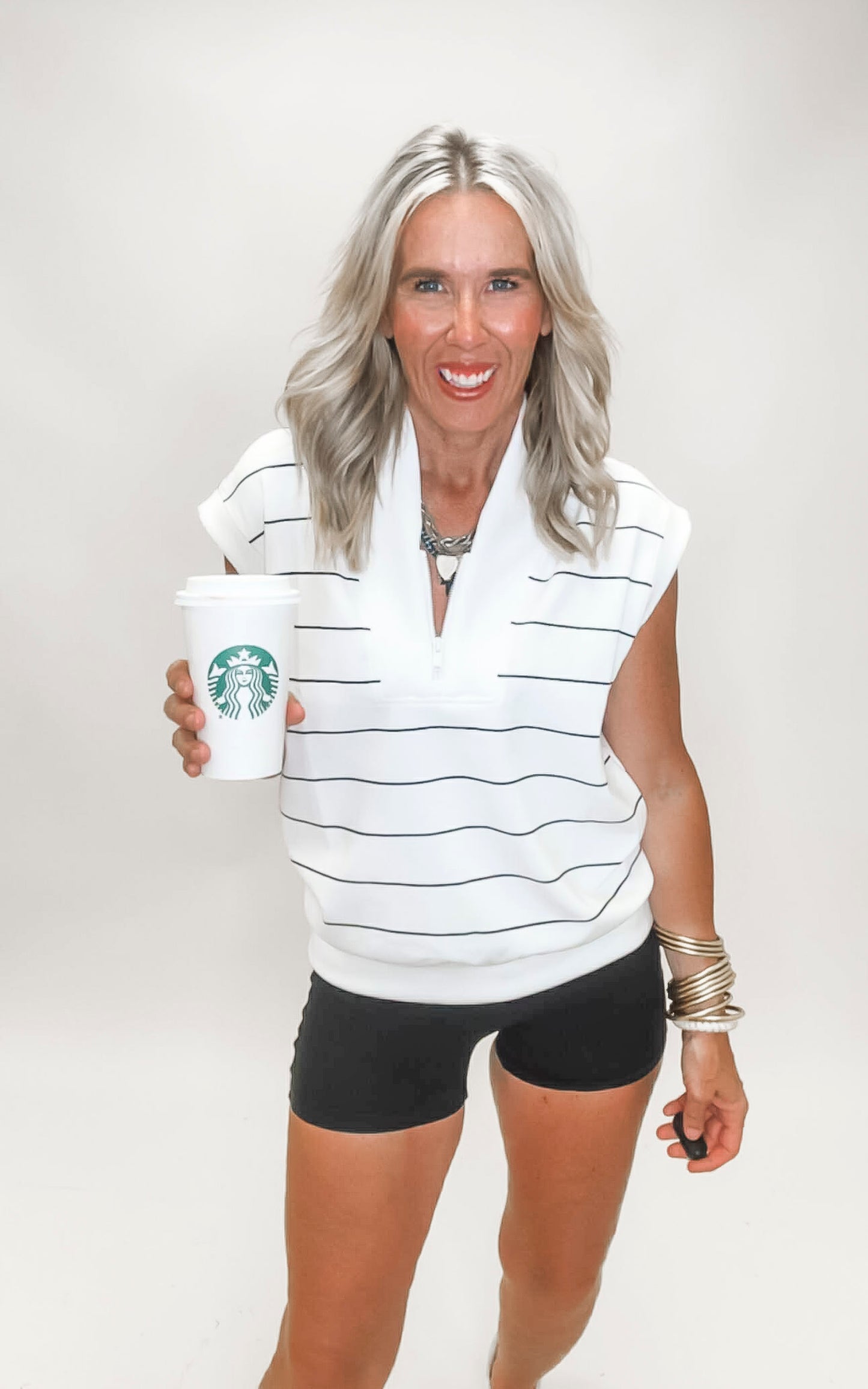 Striped RAE MODE top featuring a clean V-neckline in white with black horizontal lines