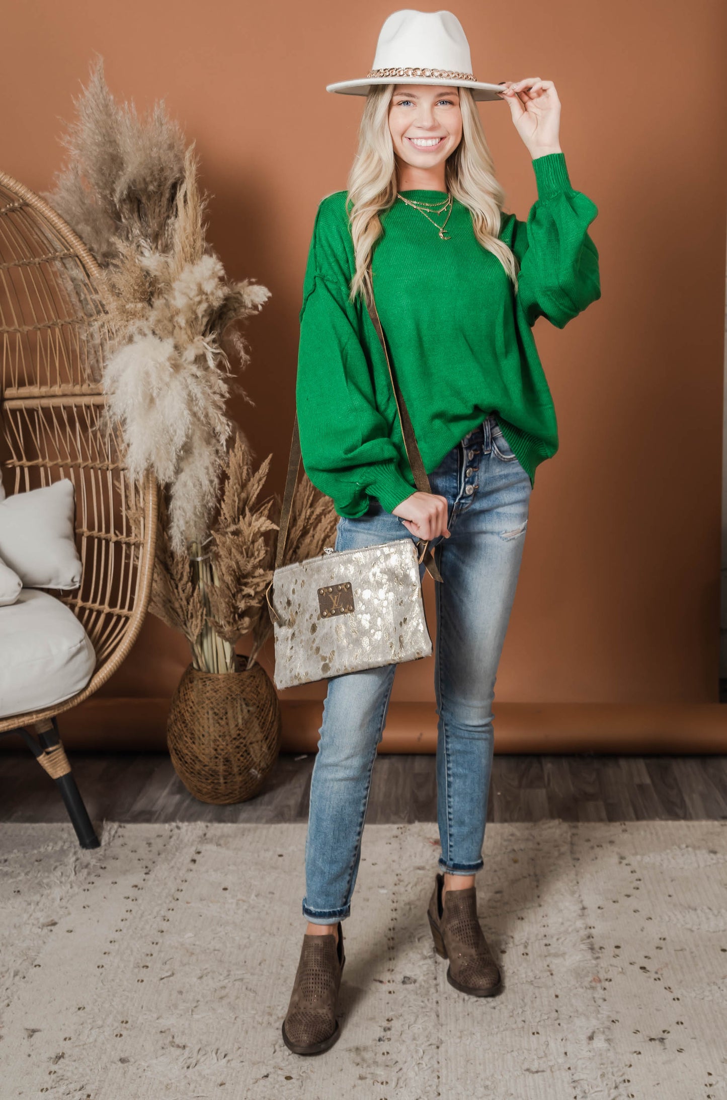 green boatneck sweater