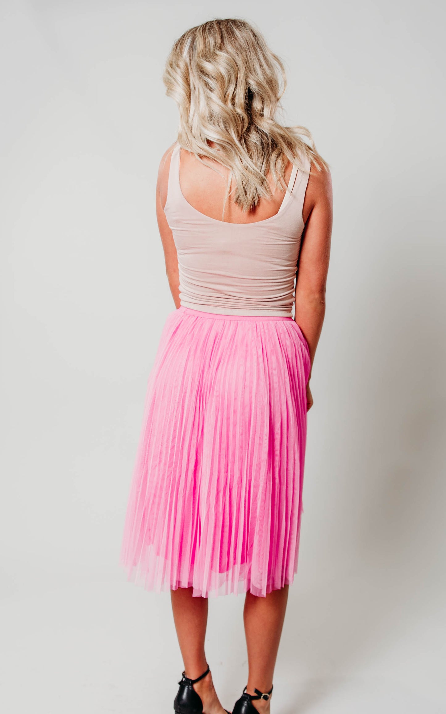 pink pleated skirt