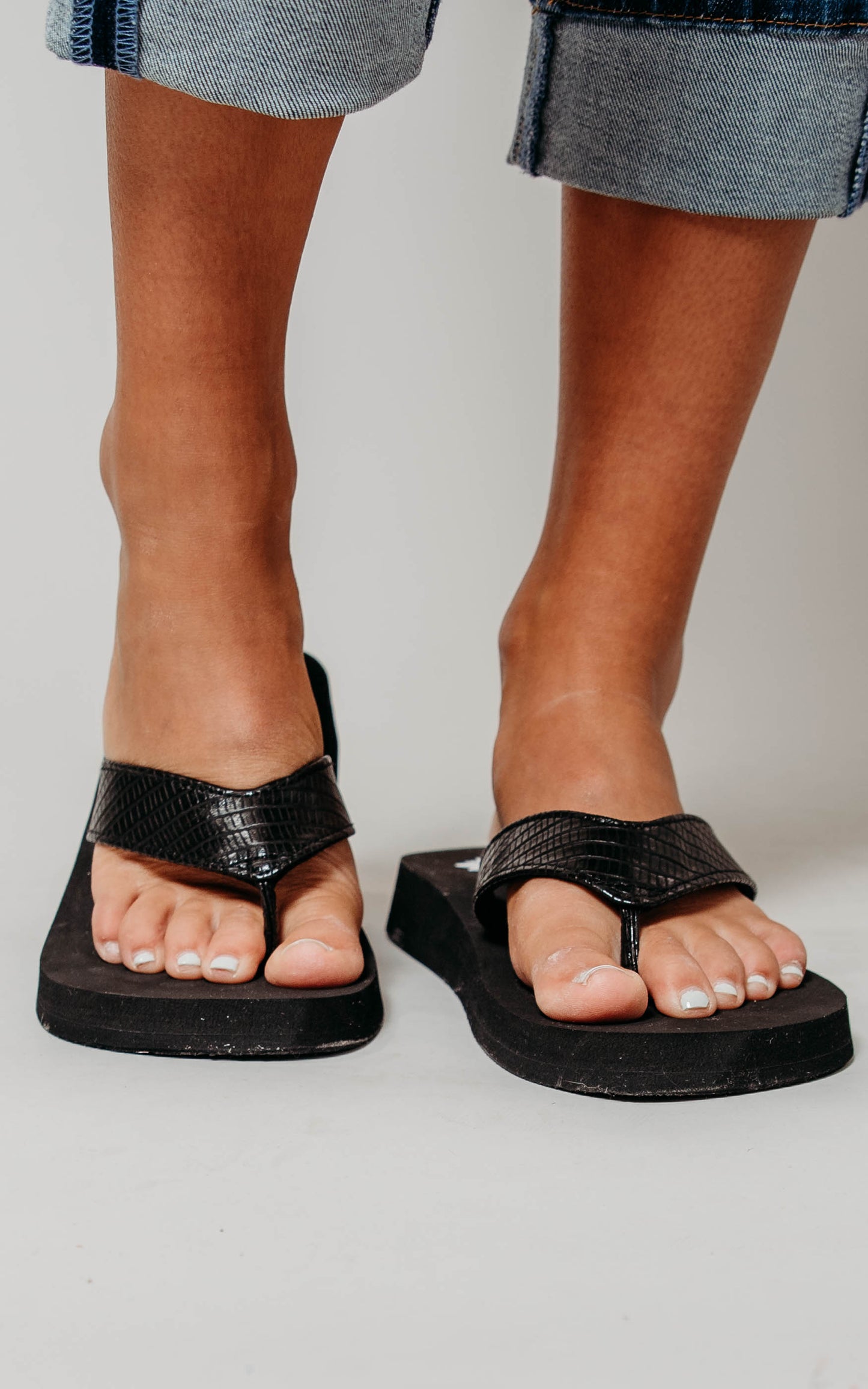 black yellowbox flip flop