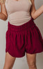burgundy running shorts