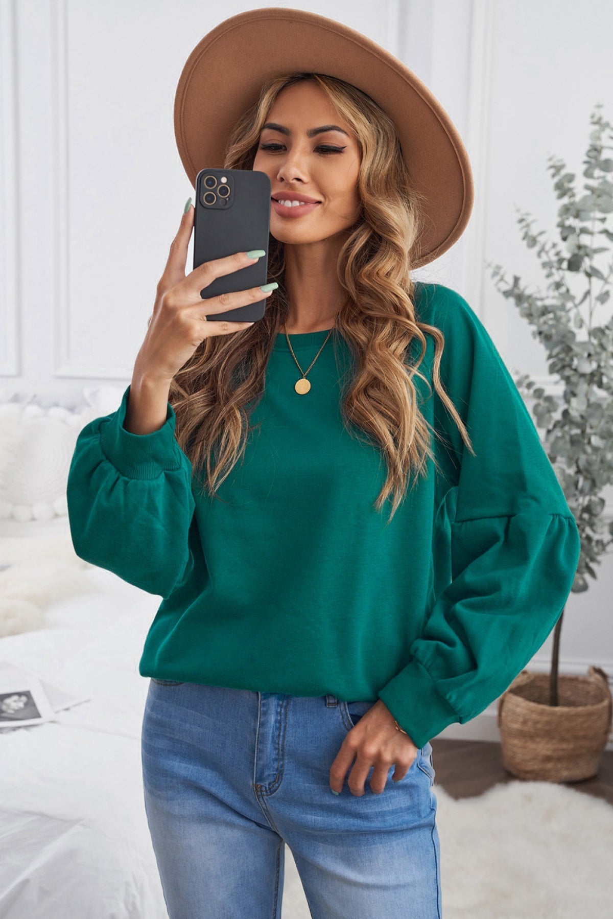 green sweater
