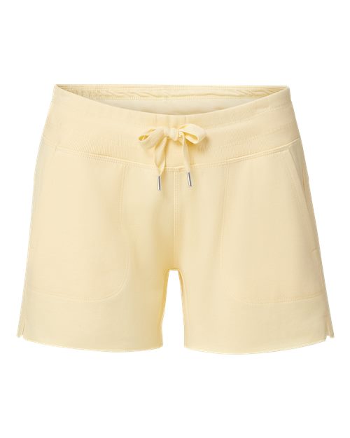 Product shot of soft yellow fleece shorts featuring an elastic waistband, front pockets, and side hem detail.