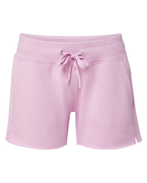 Close-up of soft pink fleece shorts featuring an elastic waistband, front pockets, and side hem detail.