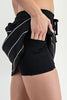 Navy athletic skort with white stripes and built-in shorts by Rae Mode.