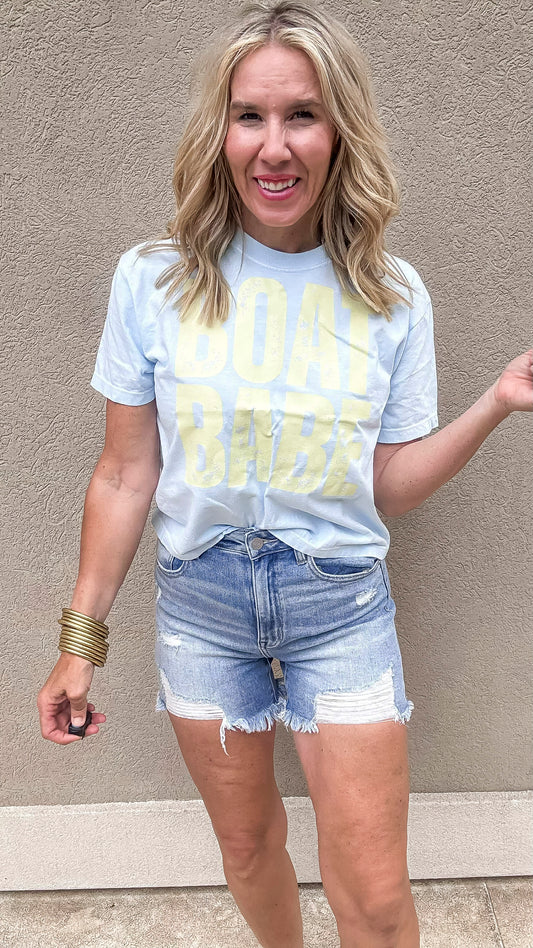boat Babe graphic tshirt on a light blue boxy t-shirt 
