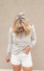 Casual taupe-and-white striped sweatshirt with a three-button henley placket and hood detail