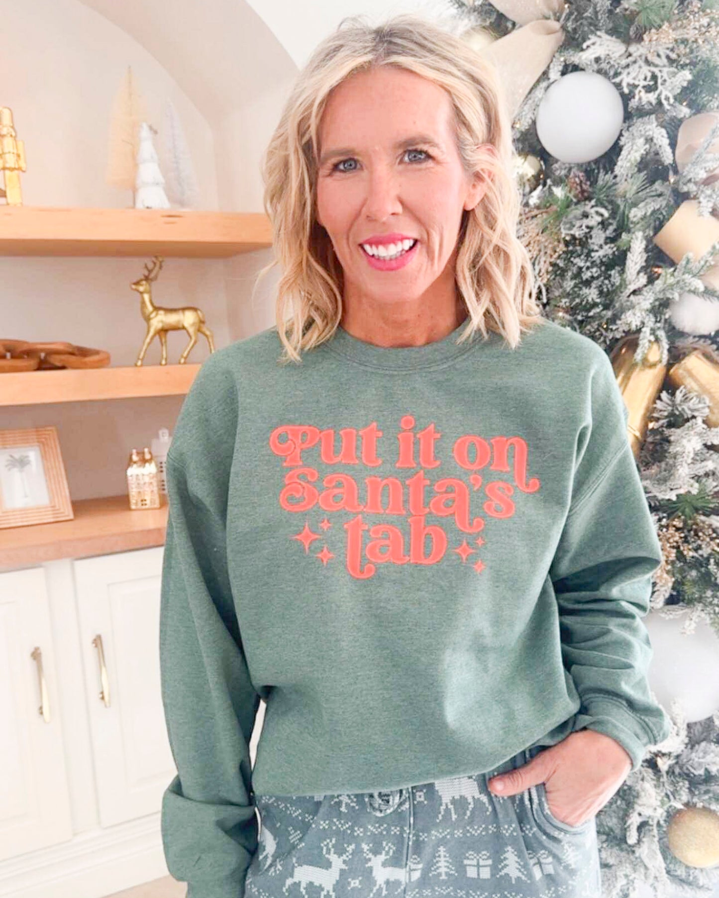 Heather Green Put it On Santa's Tab Crewneck Graphic Sweatshirt