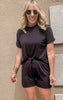 Black crew neck tee with relaxed fit and rolled short sleeves