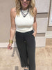 Black linen wide leg pants with relaxed fit and lightweight feel.