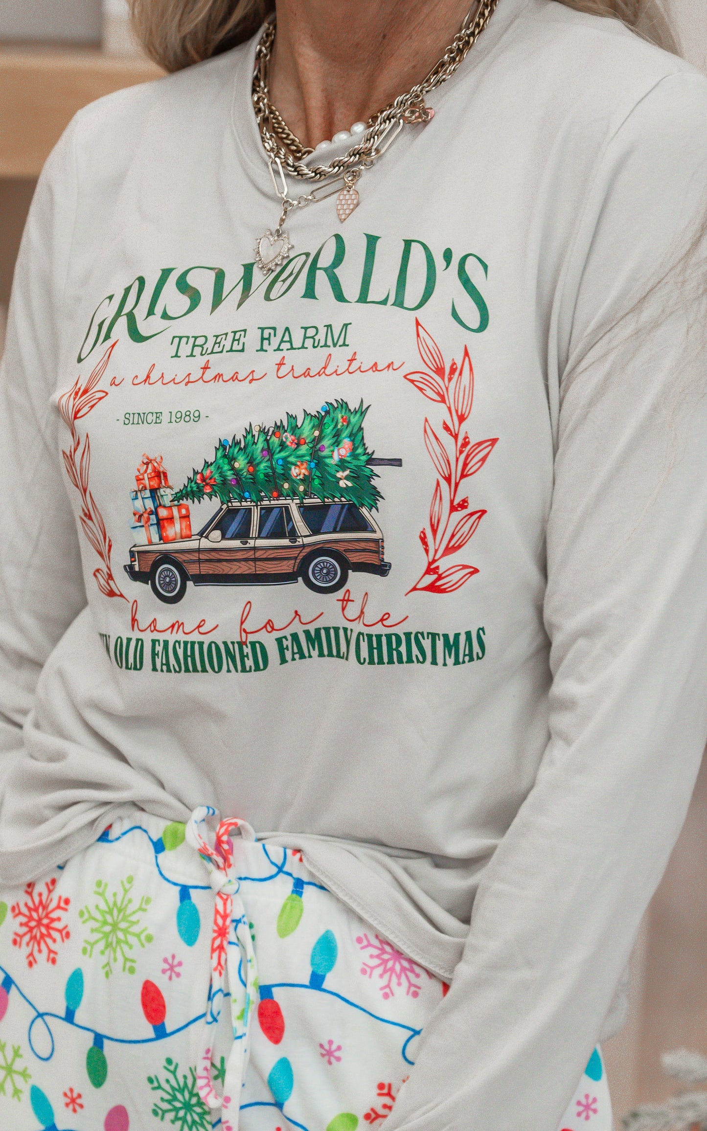 Grisworld's Tree Farm Holiday White Long Sleeve Graphic Top