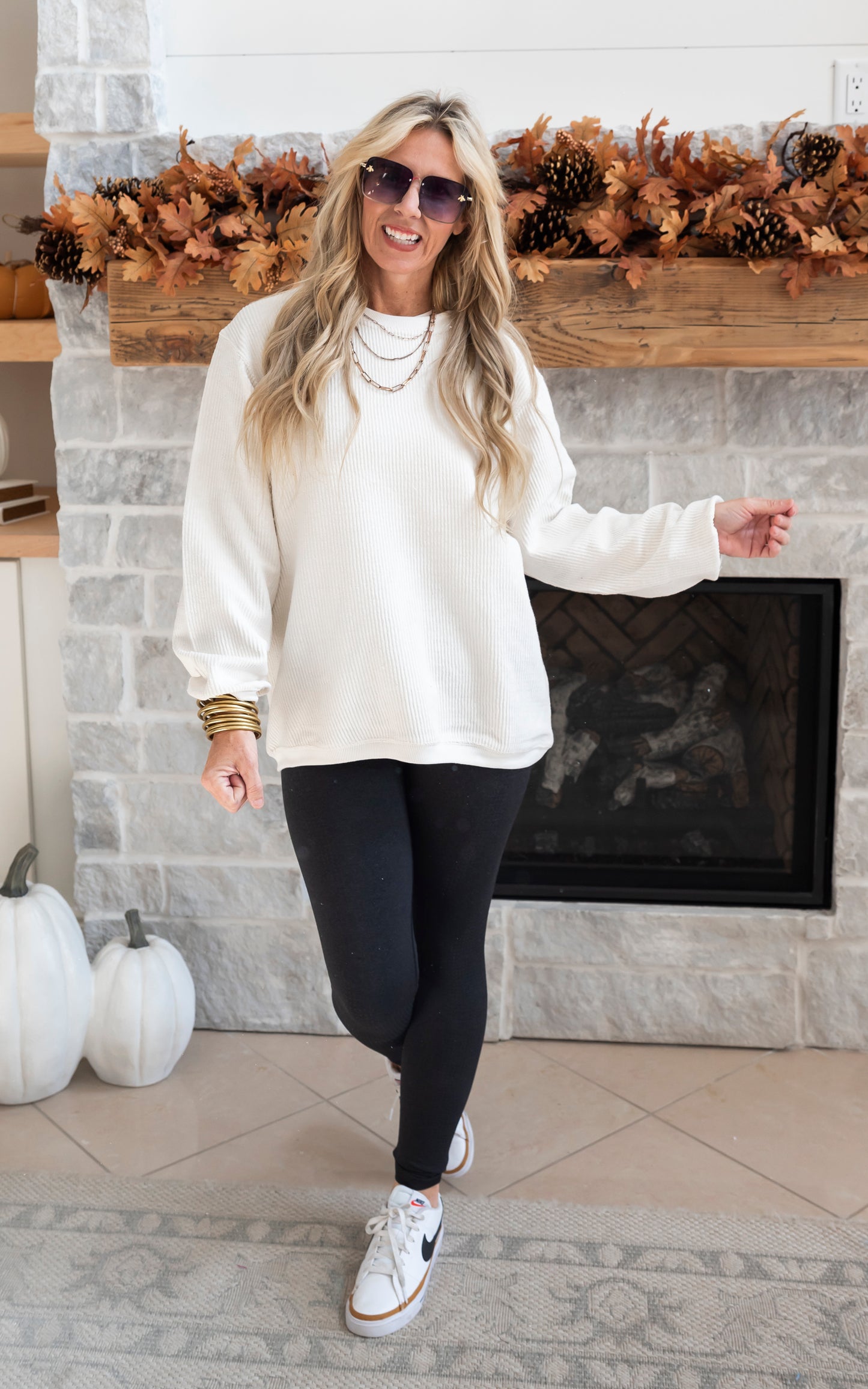 ivory crewneck with black leggings 