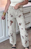 Grey denim jeans with white side stripes and subtle floral embroidery accents.