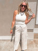 Relaxed fit khaki striped pants featuring cargo details and a breezy silhouette.