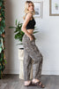 Casual washed animal print pants featuring light distressing and soft fabric.