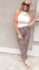 Leopard print wide leg pants styled with a ribbed white tank.
