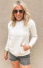 Neutral fleece pullover sweatshirt with kangaroo pocket and ribbed trim, perfect for laid-back outfits.