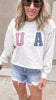 USA crewneck sweatshirt with red, white, and blue patch lettering.