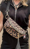 Cheetah print sidekick crossbody bag with tassel zipper and gold hardware.