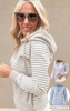 Striped long-sleeve henley hoodie with cuffed sleeves and drawstring hood, comes in 3 colors. 
