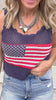 Navy USA crochet knit tank top styled with ripped denim shorts.
