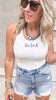 Sleeveless white bodysuit with USA detail and jean shorts outfit.