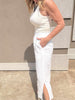 White gauze cropped pants with elastic waist styled with ribbed tank.