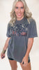Charcoal grey t-shirt with 'Spooky Season' text filled with Halloween graphics like ghosts and jack-o’-lanterns.
