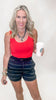 Black and white striped modal shorts with elastic waistband and relaxed fit.