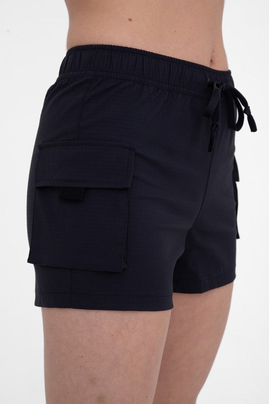 black mono b shorts 