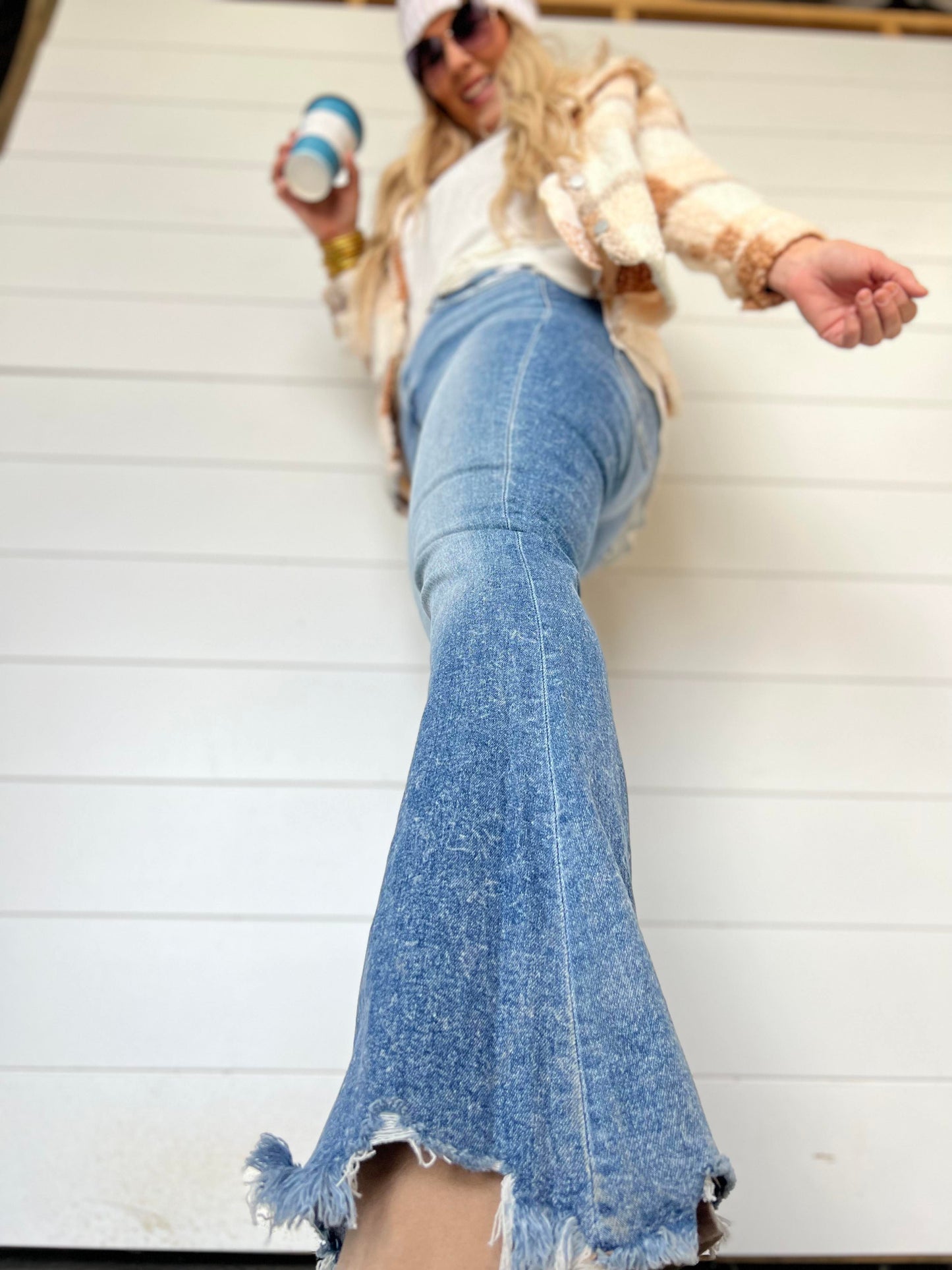 high rise uneven flare denim 