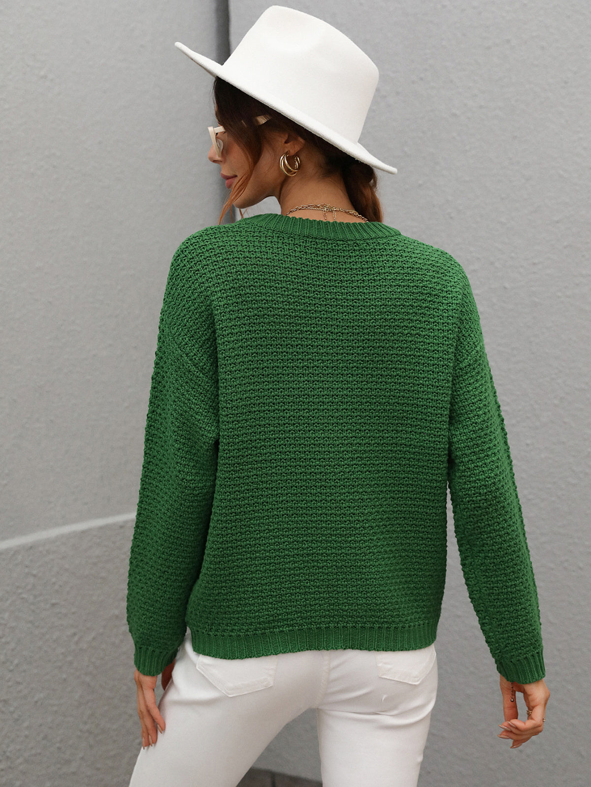 green crewneck sweater