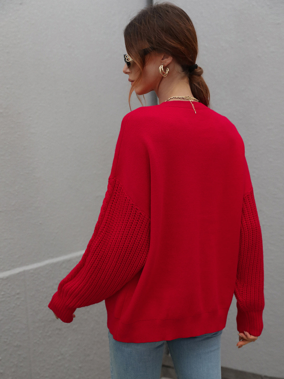 red cable knit sweater