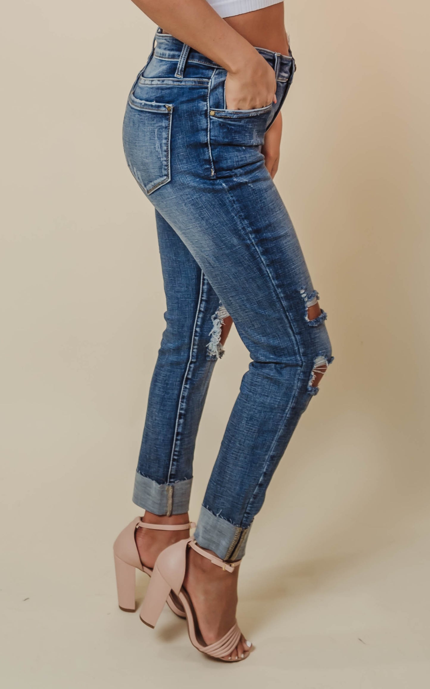 Distressed Mid Rise skinny Jean with cuffed hem