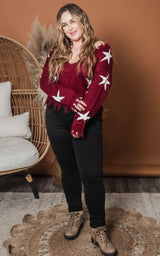 curvy girl distressed burgundy knit sweater with all over stars