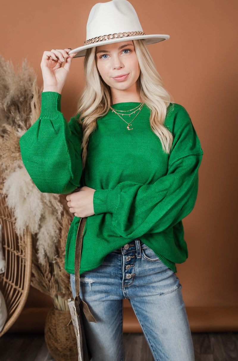 green boatneck sweater