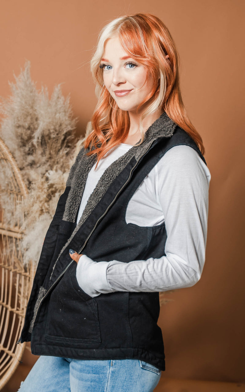 black sherpa-lined vest for outdoors