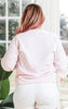 light pink sweatshirt