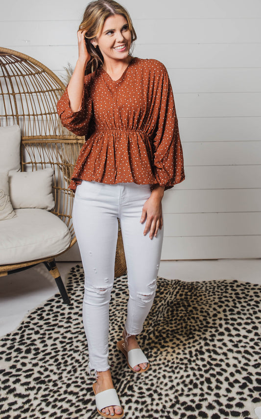 rust floral peplum blouse