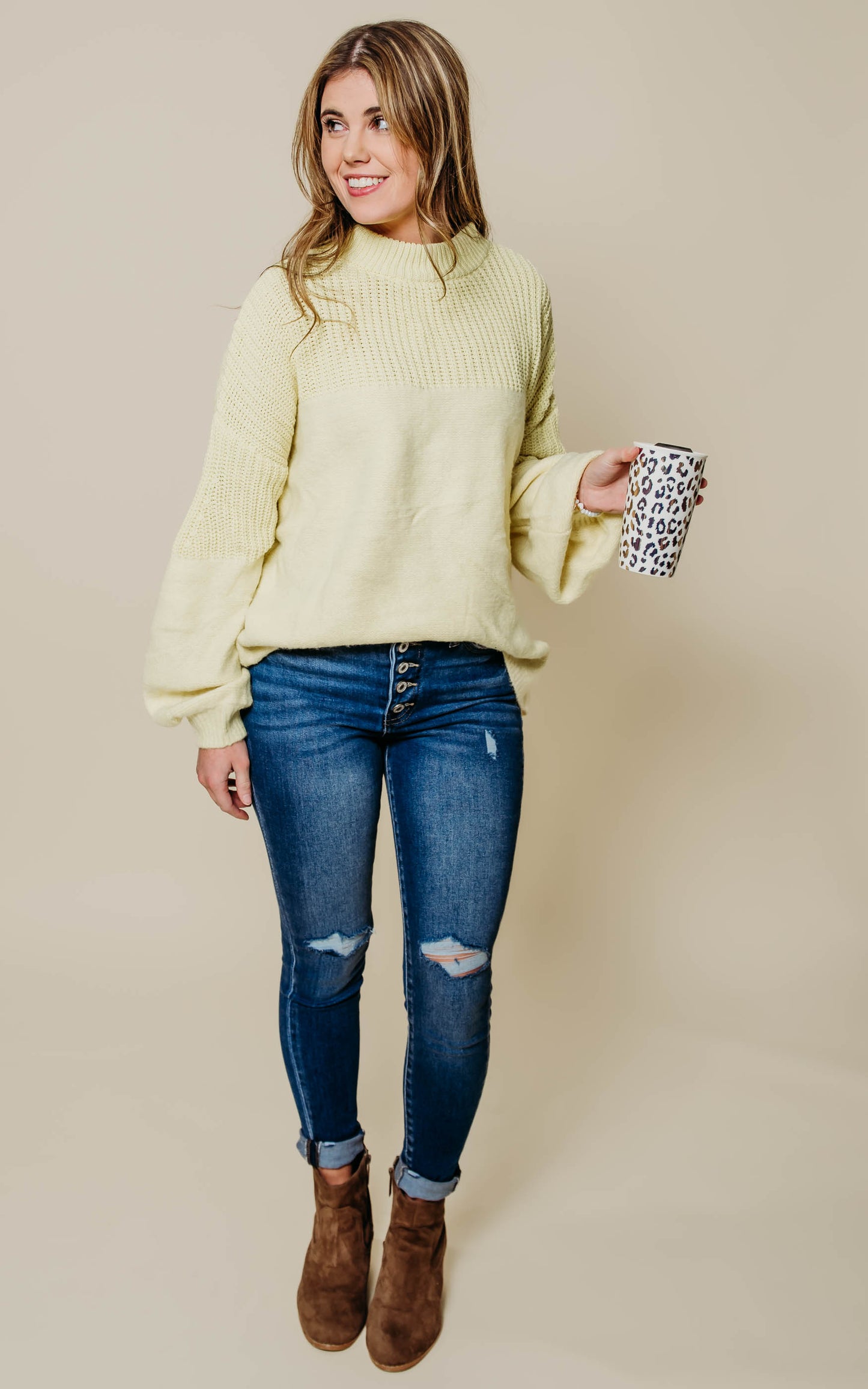 yellow sweater