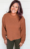 rust color sweater 